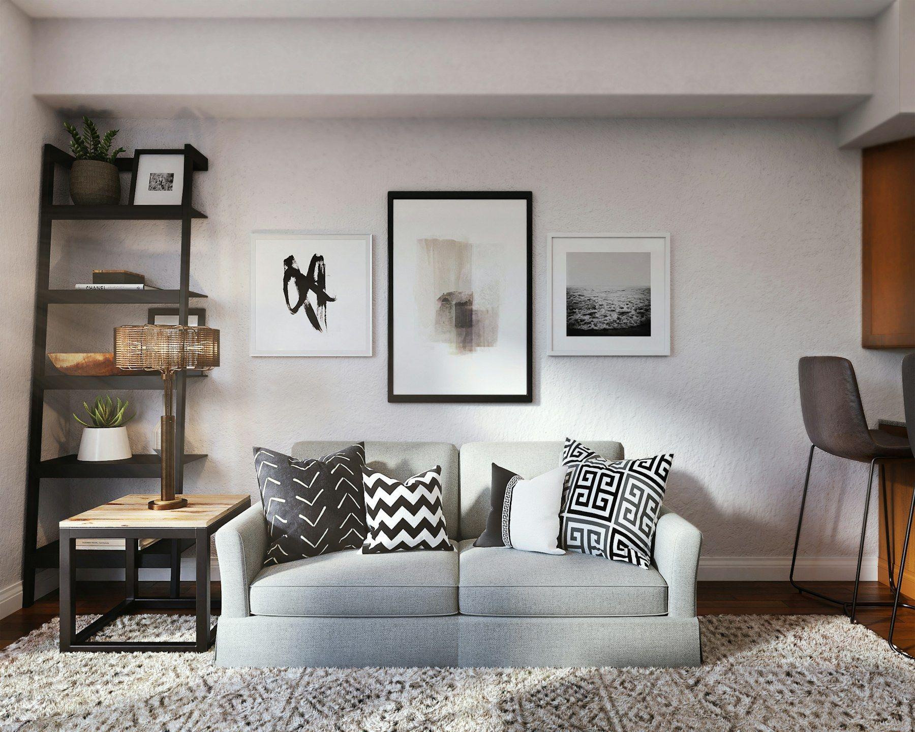 Staged living room with neutral furnishings